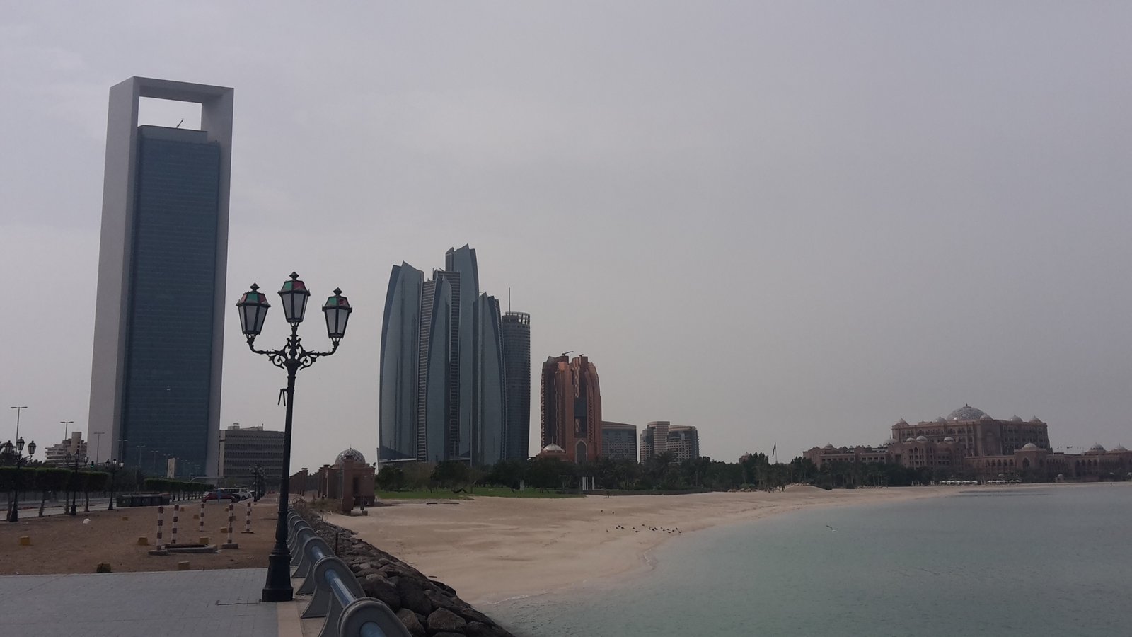 Abu Dhabi corniche with ADNOC HQ and Etihad Towers