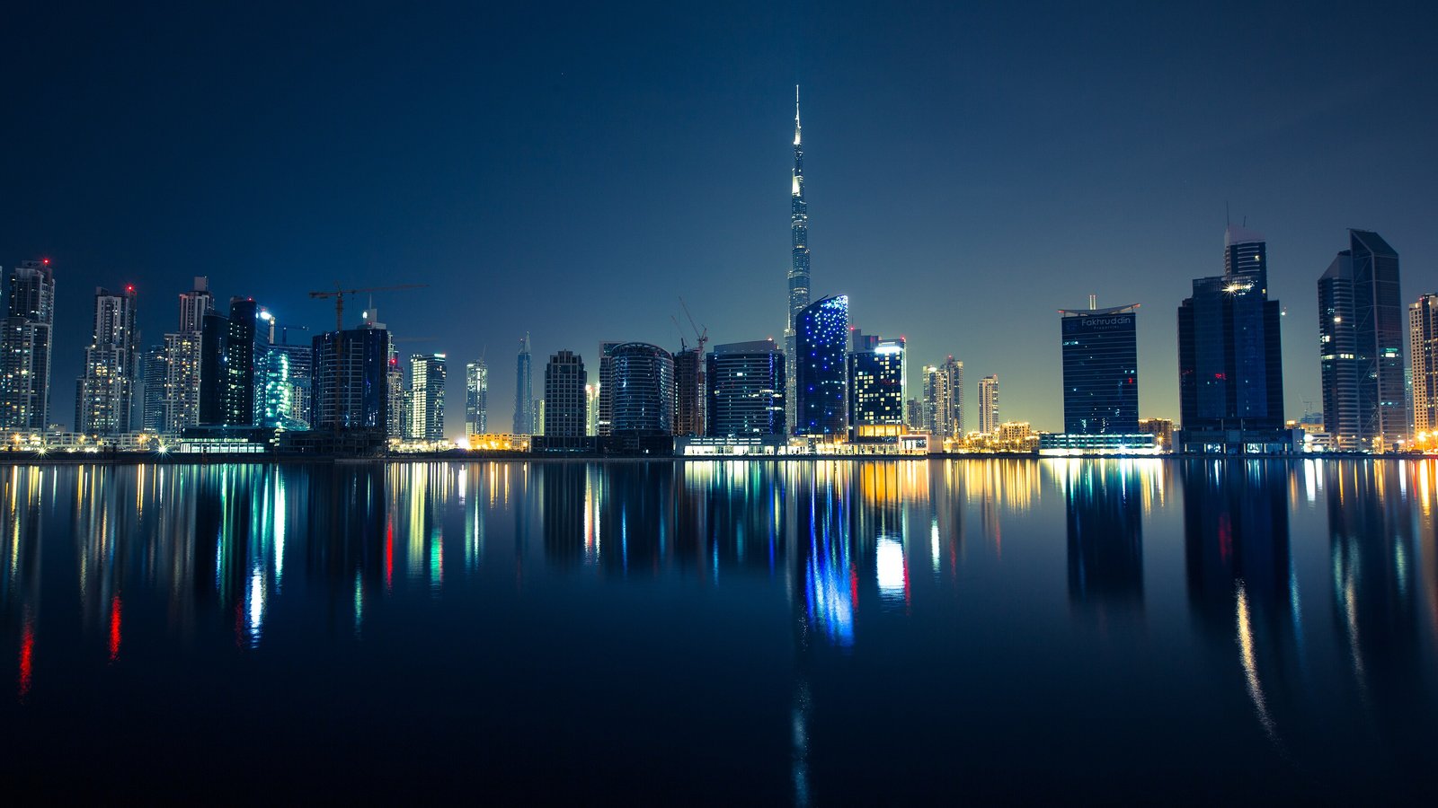 Dubai skyline at night with Burj Khalifa